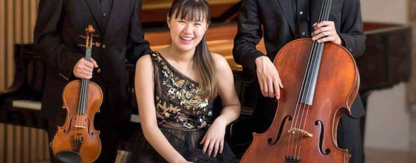 Back Trio portrait with their instruments